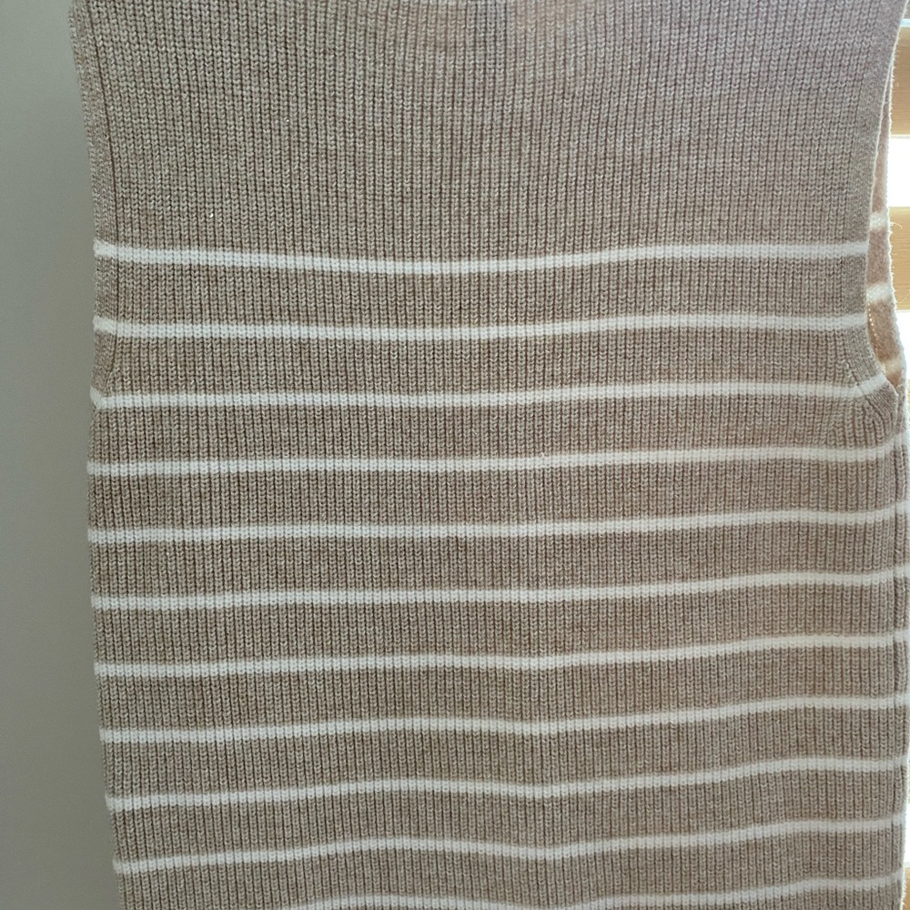 Never worn sleeveless vest with stripes size S